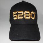 Unisex Black Cap with Golden Embroidery – Stylish Apparel & Gear for 2025